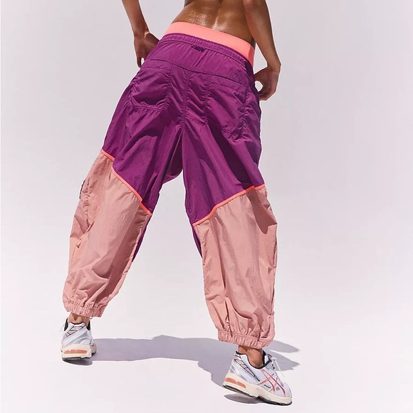 Free People MOVEMENT Free Flow Barrel Jogger Track Pants Mulberry Neon Coral - Picture 2 of 9